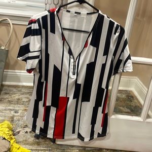 Black/white polyester t shirt with a partial zipper down the bust